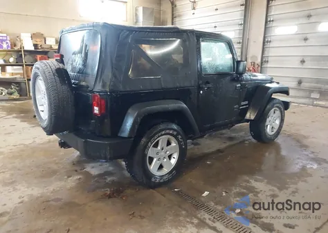 2011 Jeep Wrangler Sport z USA, uszkodzony, nr VIN 1J4AA2D15BL577182